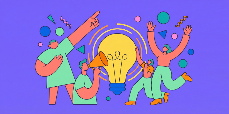 Team celebrating creative idea with big light bulb